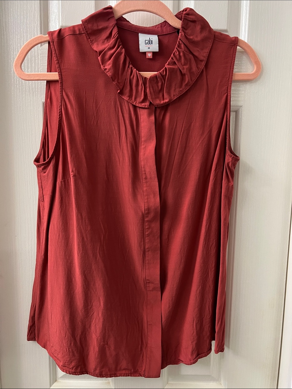 CAbi Sleeveless Ruffle Collar Blouse- Rust